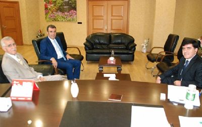 GAP İdaresi Başkanı Sadrettin Karahocagil Şanlıurfa Ticaret ve Sanayi Odası Kayyum Heyeti Başkanı'nı Ziyaret Etti